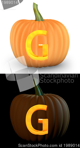 Image of G letter carved on pumpkin jack lantern