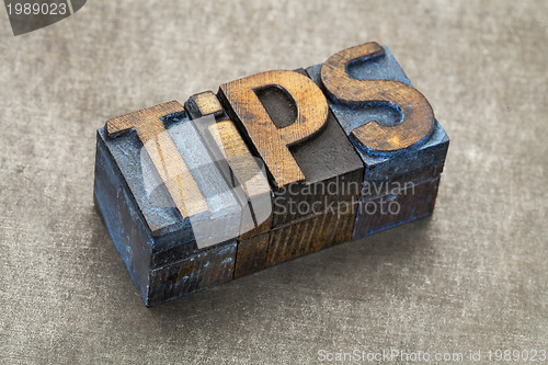 Image of tips word in wood type