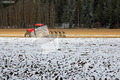 Image of Farmer on Field in Early Winter