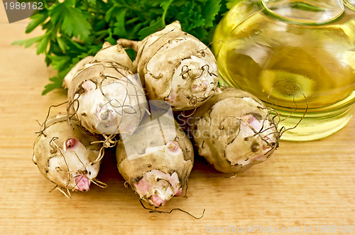 Image of Jerusalem artichokes with oil on board