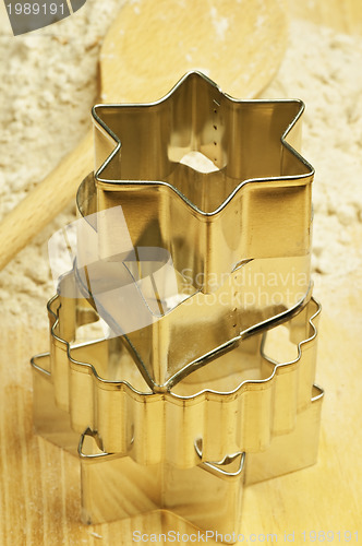 Image of flour and cutters for Christmas bakery