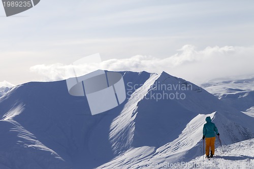 Image of Skier on top of mountain