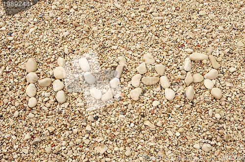 Image of HVAR word made of pebbles, authentic picture of Hvar's beach