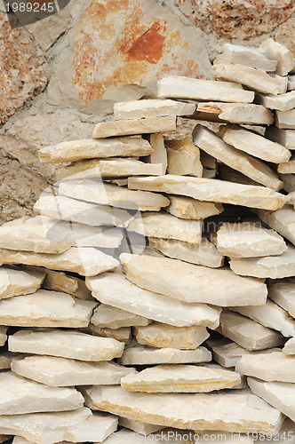 Image of Heap of flat paving stones, limestone