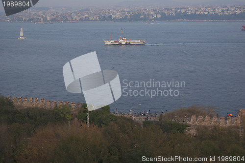 Image of Bosporus in the daylight with passenger ships