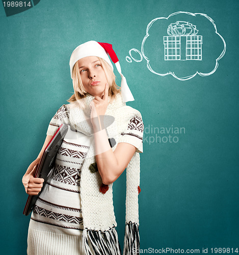Image of Woman Waiting For Christmas With Laptop