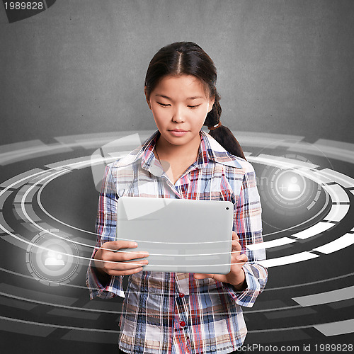 Image of Asian Girl With Touch Pad