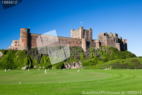 Image of Bamburgh Castle and cricket course