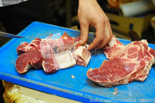 Image of cutting meat