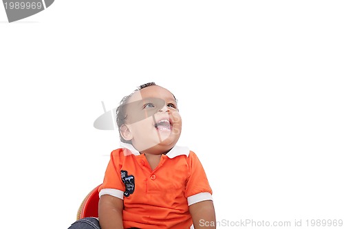 Image of Baby laughing over white background. Active one year child 