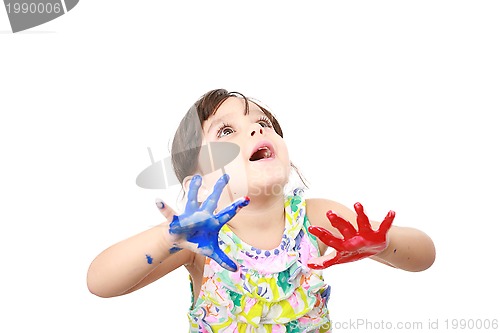 Image of Learning and play themed image of a little girl with hands paint