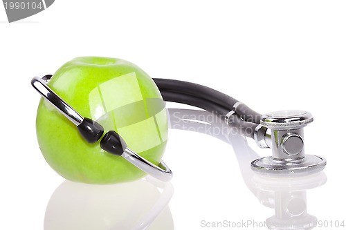 Image of Stethoscope and apple