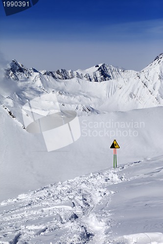 Image of Warning sing on snow slope