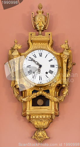 Image of Vintage Clock on the wall in the room