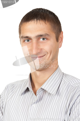 Image of Closeup of happy young man looking at camera at studio