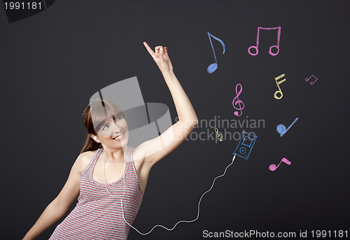 Image of Girl dancing with musical notes