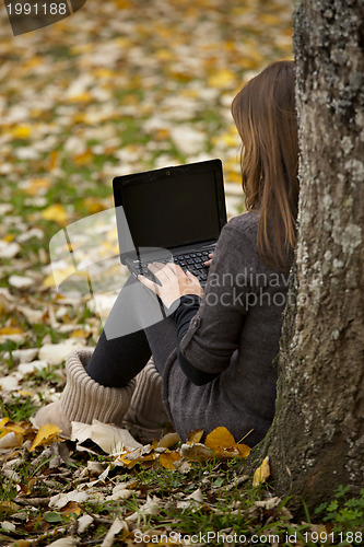 Image of Woman working outdoor