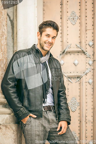 Image of young man black leather