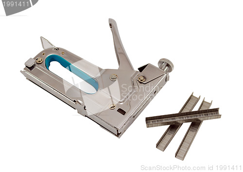 Image of stapler pin clip tool  fasten material on white 