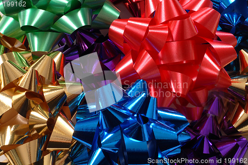 Image of Colorful Christmas bows forming a vivid background