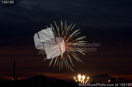 Image of Firecrackers In The Sky During Sunset