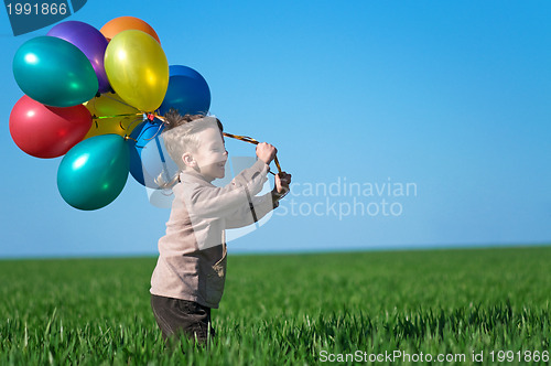 Image of Child with balloons