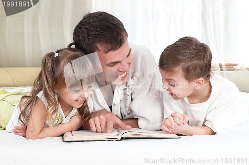 Image of Family with book