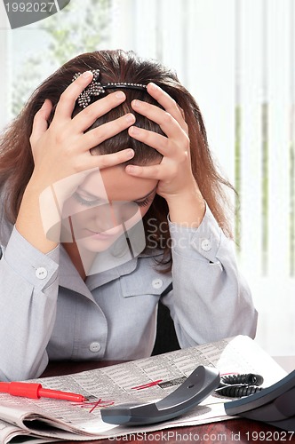 Image of Woman with newspaper