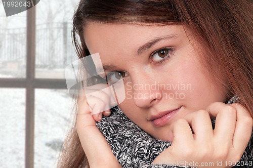 Image of Woman posing in sweater