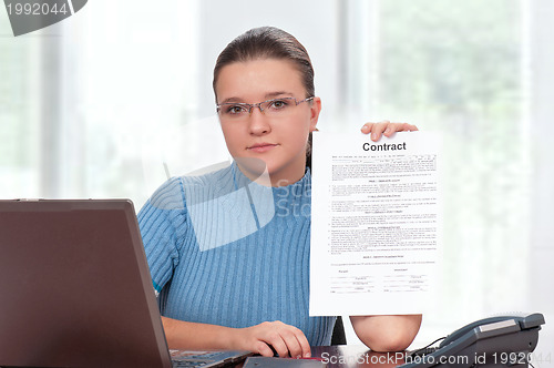 Image of Businesswoman with contract