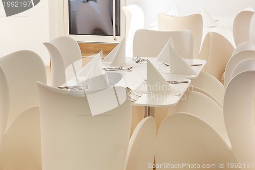 Image of Beautiful white dining area