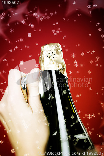 Image of Opening champagne bottle