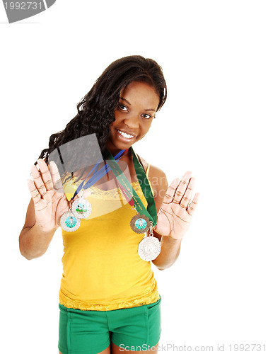 Image of Girl with her medals.