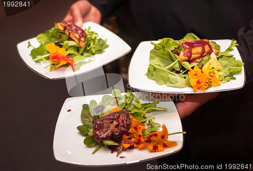 Image of Serving entrees at a banquet