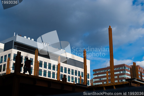 Image of Silhouetted construction worker