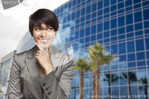 Image of Mixed Race Young Adult in Front of Building