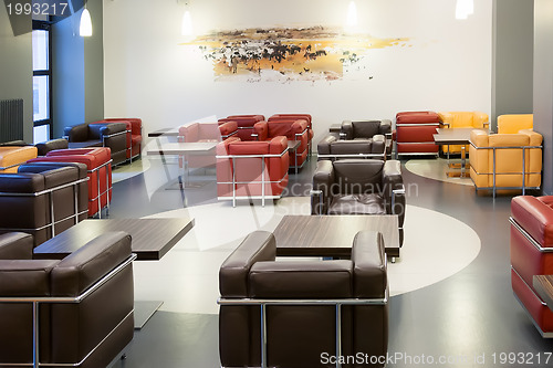 Image of Interior of fashionable modern cafe with leather furniture