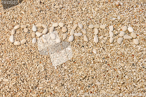 Image of Croatia word made of pebbles, authentic picture of Hvar's beach