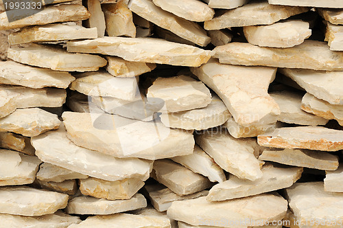 Image of Heap of flat paving stones, limestone