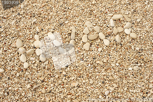 Image of HVAR word made of pebbles