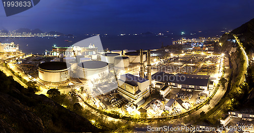 Image of Oil tanks at night