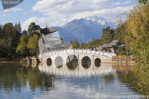 Image of Lijiang old town and Jade Dragon Snow Mountain in China