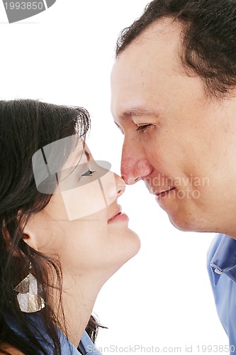 Image of happy young couple portrait smiling isolated over a white backgr