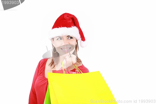 Image of Shopping Christmas woman smiling. Isolated over white background