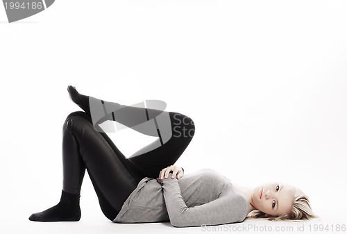 Image of blonde laying down