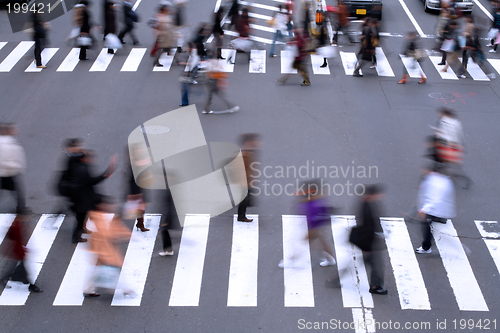 Image of People crossing the street