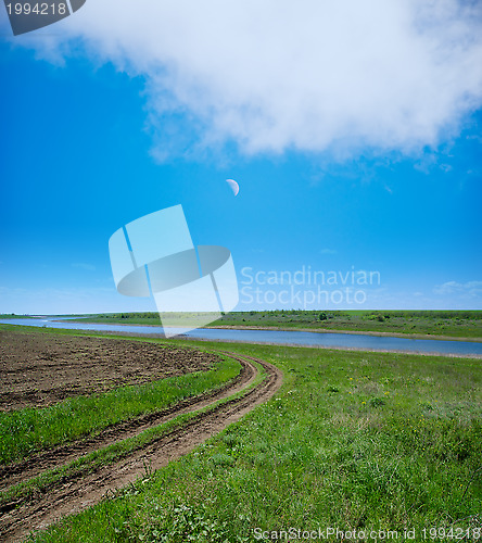 Image of evening and road near fields