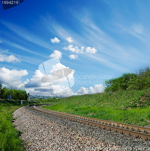 Image of railway under cloudy sky