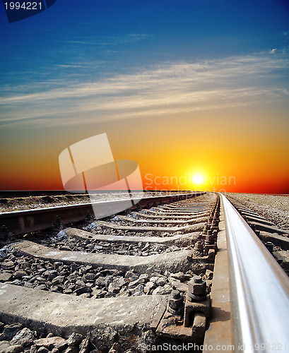 Image of railroad to sunset