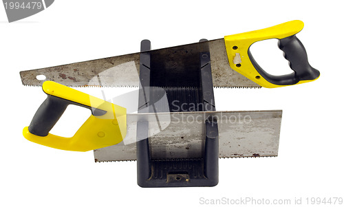 Image of miter box angle cut tool and hand saws on white 